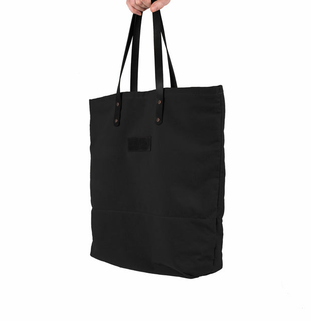 Black handmade leather and canvas tote bag. British made.