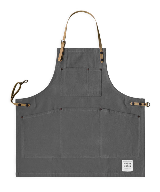Children's handcrafted grey canvas apron with removable cork straps: made in Britain.