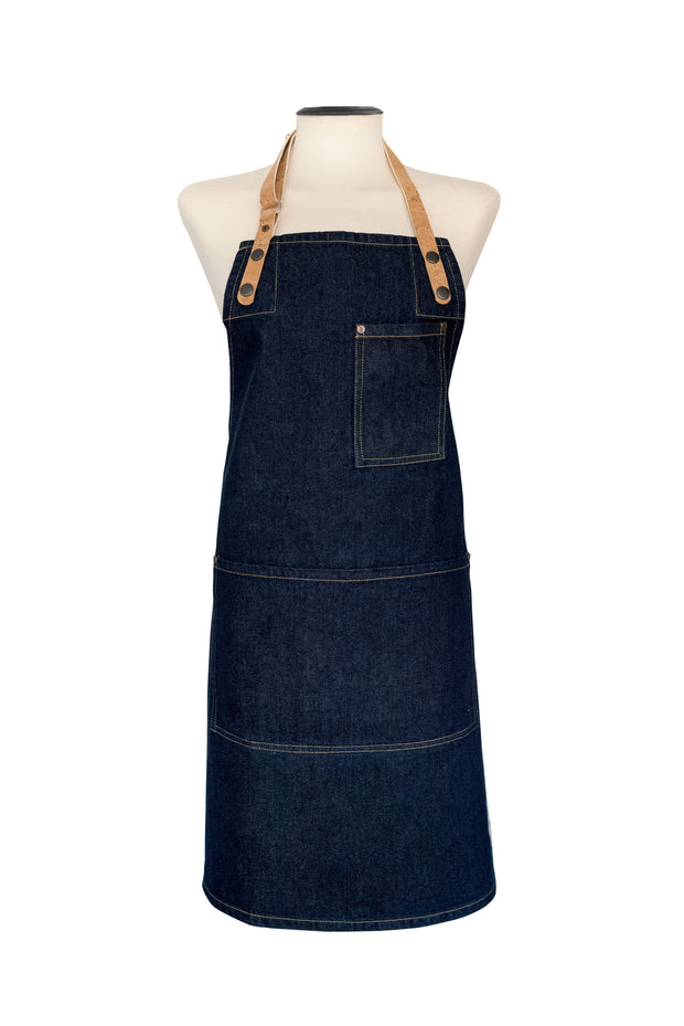 Handcrafted, denim apron; made in Britain with pockets and removable cork straps.