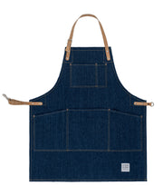 Handcrafted, denim apron; made in Britain with pockets and removable, cork straps.