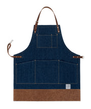 Handcrafted, denim apron; made in Britain with pockets and leather trim and straps.