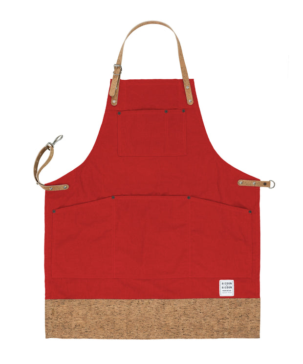 Handcrafted, factory red canvas apron; made in Britain with pockets and cork trim and straps.