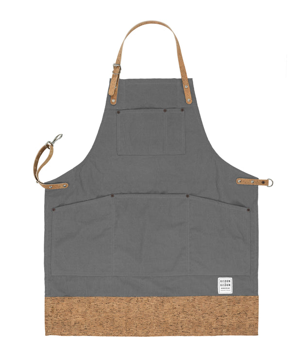 Handcrafted, heritage grey canvas apron; made in Britain with pockets and cork trim and straps.