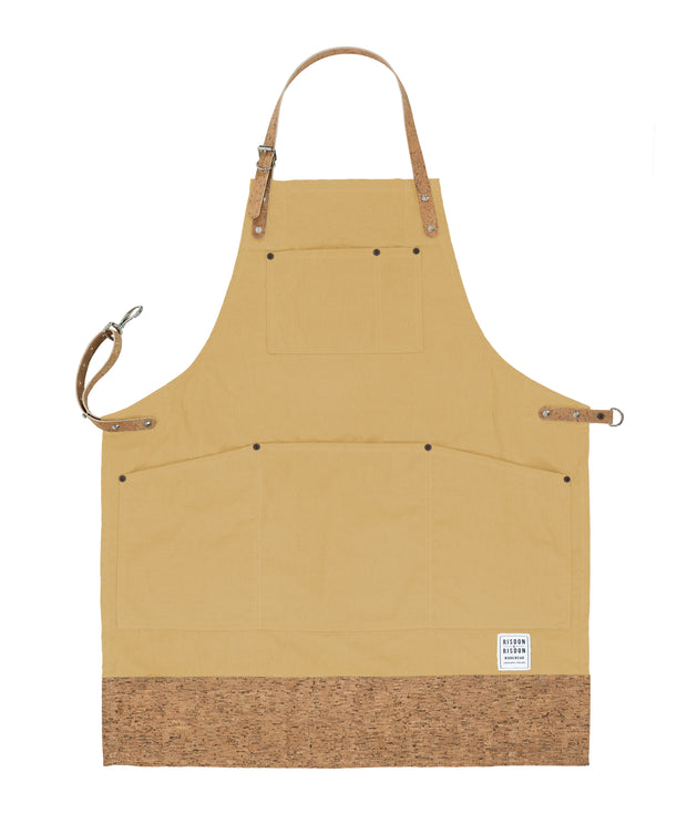 Handcrafted, trade brown canvas apron; made in Britain with pockets and cork trim and straps.