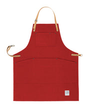 Handcrafted, factory red canvas apron; made in Britain with pockets and removable, cork straps.