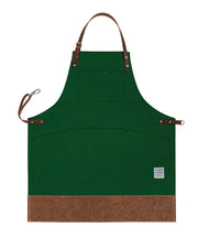 Handcrafted, Shropshire green canvas apron; made in Britain with pockets and leather trim and straps.