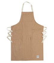Handcrafted, trade brown canvas apron with white straps; made in Britain.