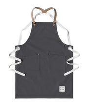 Children's handcrafted charcoal canvas apron with removable cork straps: made in Britain.