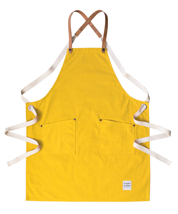 A handcrafted canvas apron with removable corck straps 