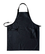 An all leather handcrafted black apron with removeable straps. made in britan