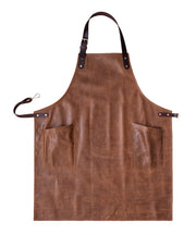 An all leather handcrafted apron with removeable straps. made in britan