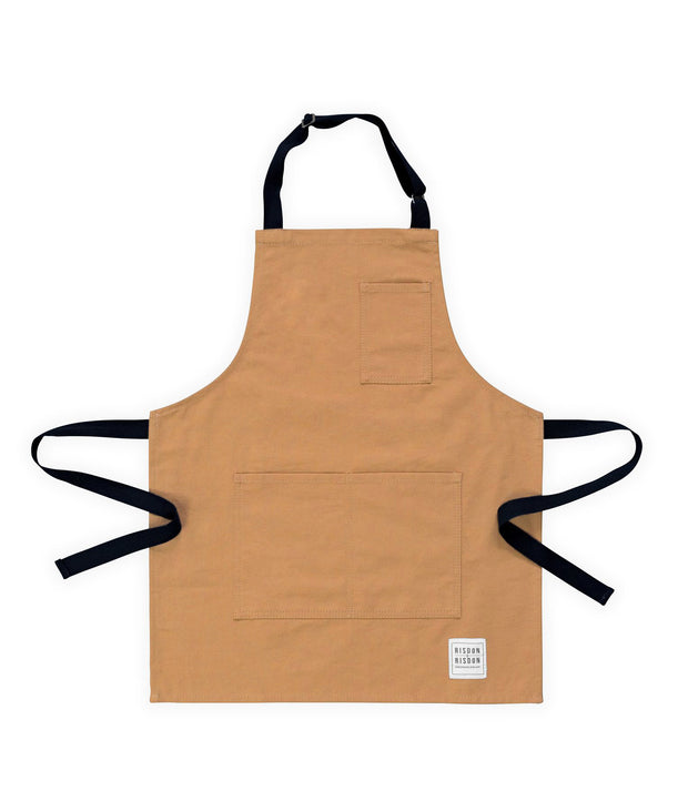 A kids brown canvas hancrafted apron made in britan