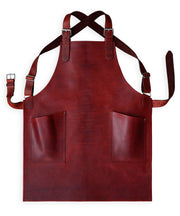 Handcrafted, fig red leather apron; made in Britain with matching pockets and straps.