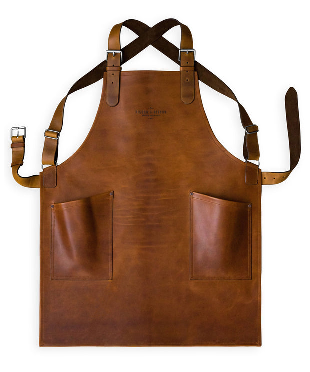 Handcrafted, tan leather apron; made in Britain with matching pockets and straps.