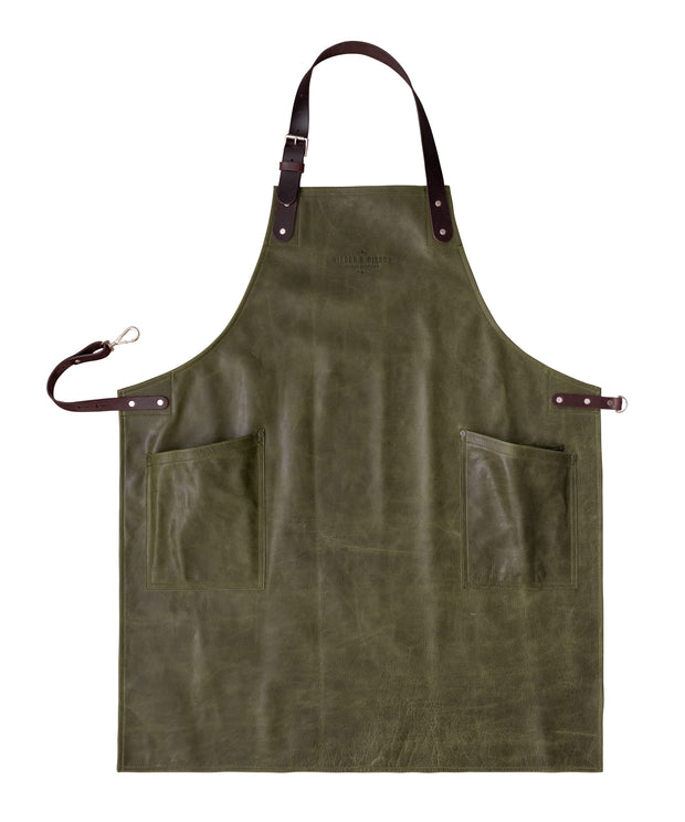 An all leather green handcrafted apron with removeable straps. made in britan
