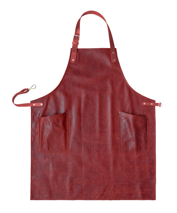 An all leather handcrafted red apron with removeable straps. made in britan