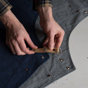 Made in England Risdon and Risdon navy canvas and cork vegan apron with cork trim handmade in the uk British Design cork heritage grey detail