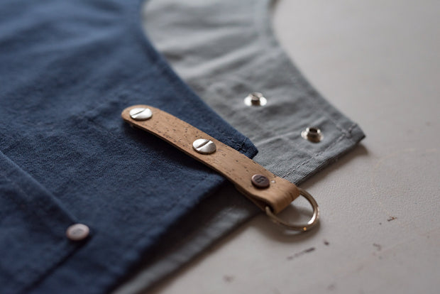 Made in England Risdon and Risdon navy grey canvas and cork vegan apron with cork trim handmade in the uk British Design cork